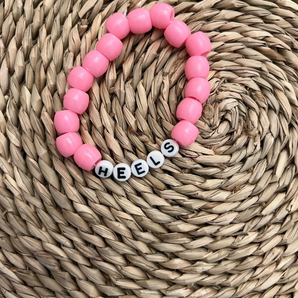 Playful Pink Beaded Bracelet With Letter Charms